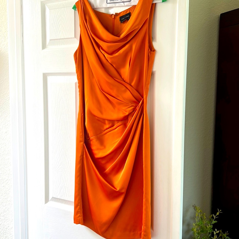 Worn one time beautiful rust/orange ruched cocktail dress
